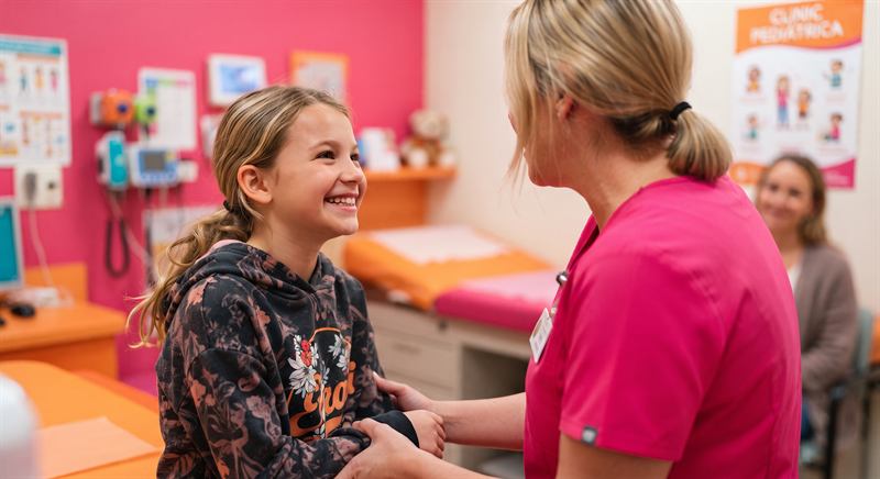 A girl chatting with one of Elladee's nurses at a Bloom session